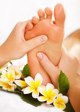 A picture of a foot being massaged.