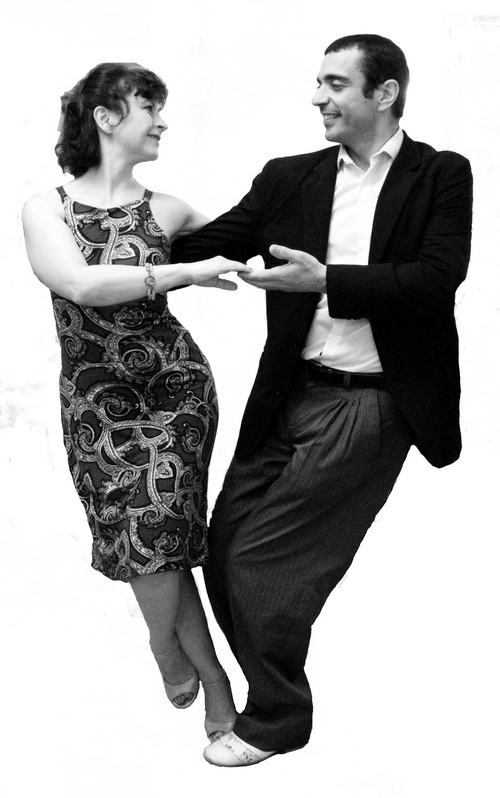 Jolanta and Bassem in colgada pose.